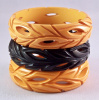 BB95  black cut out bakelite bangle